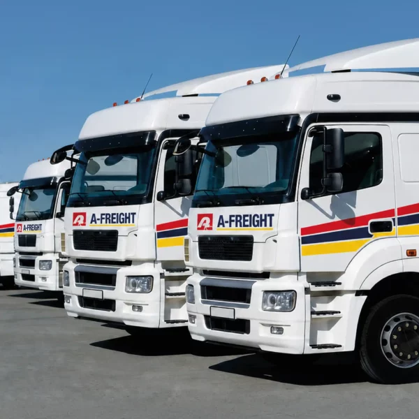 NU-COAT Nu-Sign ‘P’ Series polymeric sign vinyls - red, yellow and blue decals from the full range of colours applied to a fleet of branded white trucks.