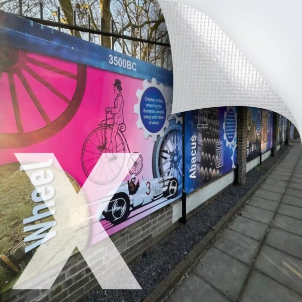 NU-COAT P12-H-X graphics vinyl with a HighGRAB airXit adhesive for easier, faster bubble-free self-adhesive applications is used here for printed educational display hoardings that inform and decorate as well as providing privacy as they surround the exterior of a school fence.