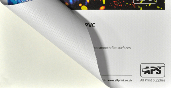 PrintDot print vinyl for architectural wall graphics and the like, with the printed face vinyl peeled back at the bottom left hand corner exposing the pattern of the dot adhesive in close-up detail.