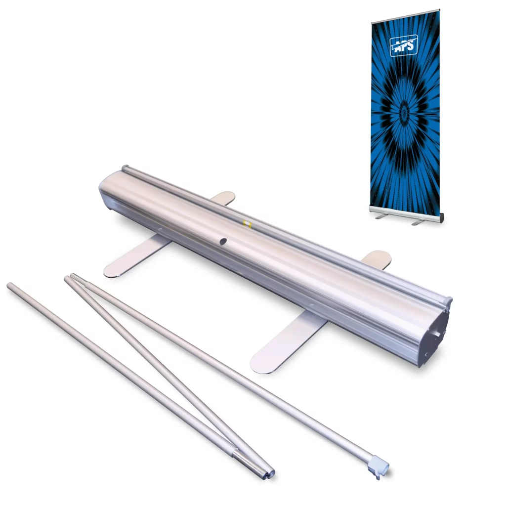 In the foreground, a dissembled Altona Two pull-up display stand, detailing the graphics catridge/cassette and the extendable pole mechanism and in the distance a fully assembled roll-up stand with printed banner insterted.