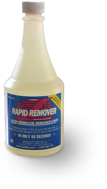 RAPIDREMOVER pale lemon colour liquid for removal of graphics adhesives is in its' 946ml bottle which has a corrugated neck for easier gripping. The bottle has it's screw cap on the lid rather than having the spray nozzle option inserted into the neck of the bottle.