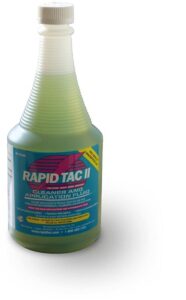 RAPIDTAC II green liquid for application of graphics onto windows and the like is in its' 946ml bottle which has a corrugated neck for easier gripping. The bottle ihas it's screw cap on the top rather than having the spray nozzle inserted.