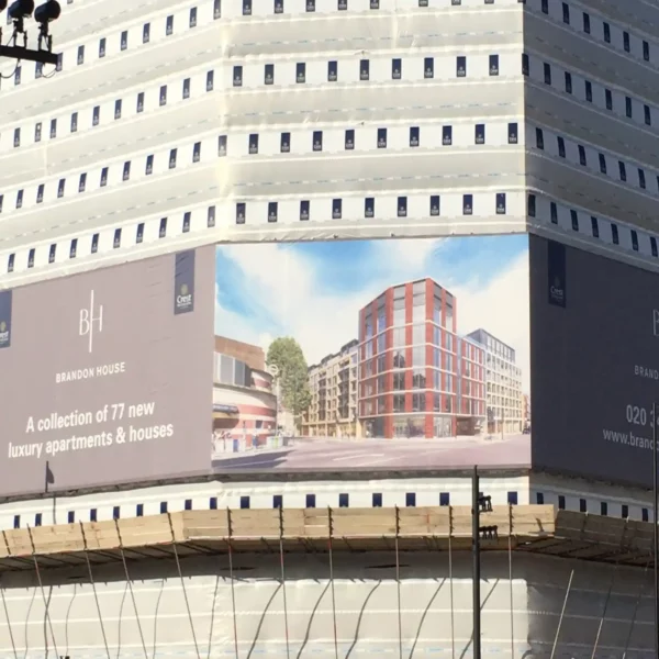 DigiPRINT RipStop, low cost, smooth matt frontlit scrim PVC banner wrapped around construction scaffolding and printed with promotional new housing advertising.