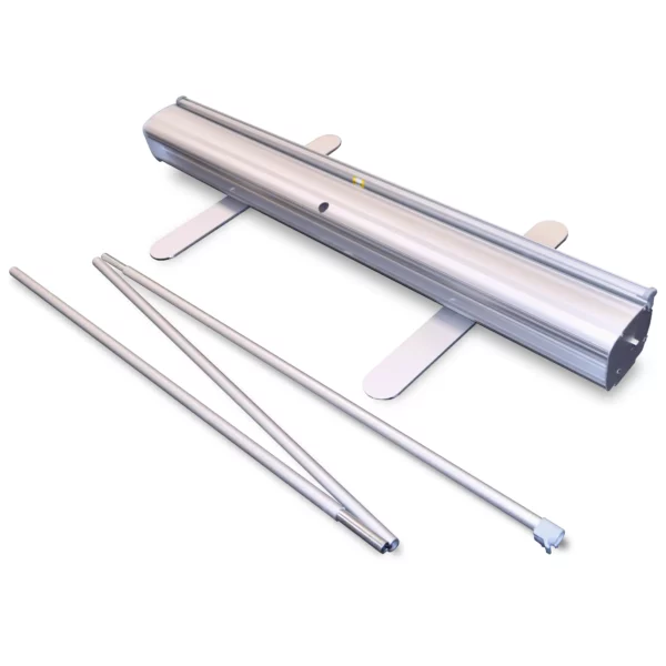The Altona Two, classic roll-up banner stand dissembled into it's basic parts: a three part bungee connected foldable pole and the graphics cartridge behind this, with it's two sturdy, stable feet fully pulled out and the graphics locking pin visible on the side of the cassette.