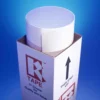RTape Conform Series of self-adhesive graphics application papers come in the pictured black and white printed R-Tape branded packaging used for all of their different image transfer tapes. Thee photo shows the box standing vertically upright with the top open and a roll of app tape peeking out from the top of the box.