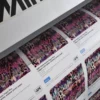 Sihl 3689 TriSolv digital inkjet paper produces vibrant billboard poster prints for high impact large format visual advertising, shown in close-up printing sets of imposed colour samples on a Mimaki wide-format digital inkjet printer.