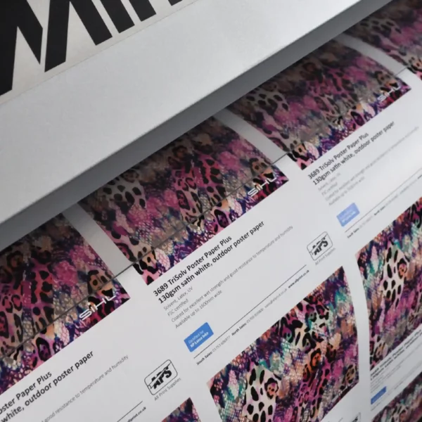 Sihl 3689 TriSolv digital inkjet paper produces vibrant billboard poster prints for high impact large format visual advertising, shown in close-up printing sets of imposed colour samples on a Mimaki wide-format digital inkjet printer.
