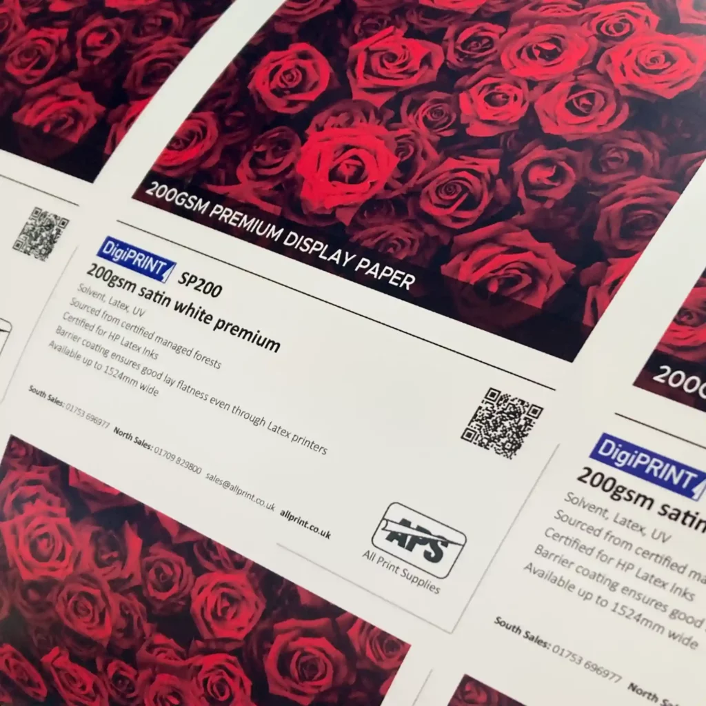 DigiPRINT SP200 digital inkjet poster paper printed across the full roll width of media with imposed images of the A5 samples using an image of a bed of red roses.