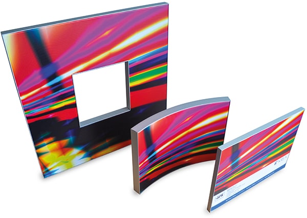 Speedy-911-11 display fabric media in a curved shape tension frame, a square shaoed frame with a square whole in the central part of the tension frame and a small portrait tension frame in front of these two framed shapes.