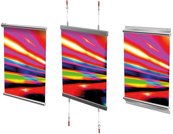 This image shows three different hanging fabric banner framing options: on the left is a circular shaped bar holding a stretched printed fabric by the top and the bottom that attaches to a wall and sticks horizontally outwards, the middle image shows a typical farbic banner hung with 2 x wire threads attached to a tubular shaped bar at the top and bottom of the print and the the last image on the right shows an offset tube shaped barr holding a fabric print by the top and bottom which is screwed into a wall (so would face outwards parallel from the wall surface).