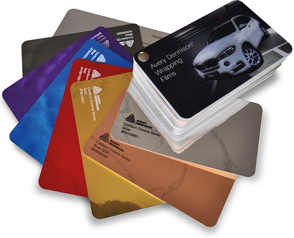 Supreme Wrappping Film Conform Chrome coloured metallic shiny vinyl sample pages fanned out from swatch showing all 8 chrome vinyl colours.