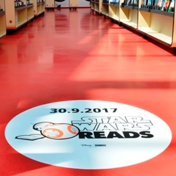 Nechen's UV dot print 'n' walk floor vinyl used to produce this custom 'Star Wars Reads' promotional wayfinding floorprint graphic for an in-store promotion.