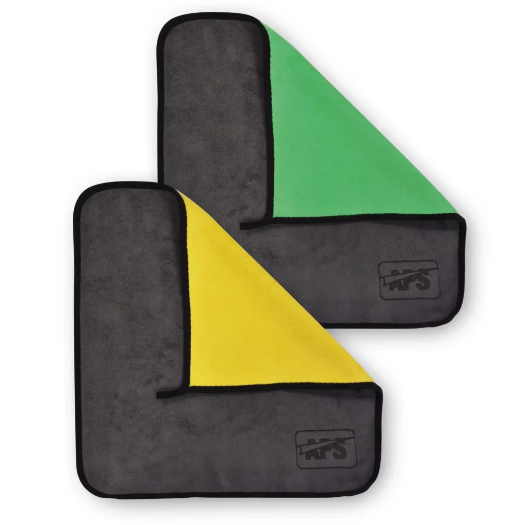 Cleaning and buffer cloths for finishing off vinyl wraps are super soft fiberous cloths in green/grey or yellow/grey colours with APS branded black logo in the bottom right corner.